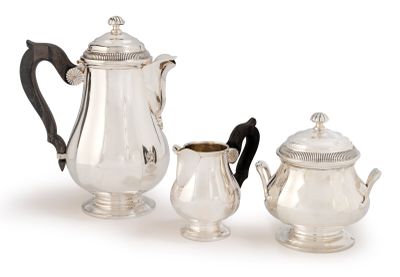 three pieces of silver tea and coffee set on a white background