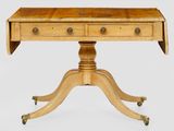 une image représentant une petite table en bois à deux tiroirs montée sur roulettes