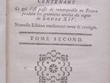 an old book with a black and white title on it
