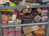 a cart full of boxes and other items on the street