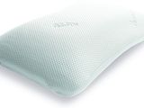 a close up of a pillow on a white surface