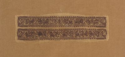 two pieces of cloth with a design on it