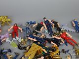 a lot of action figures that are on the table