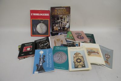 a lot of books that are sitting on a table