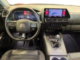 a picture of the interior of a car with a touch screen