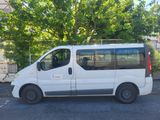 a white van that is parked in a parking lot