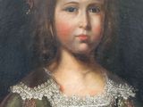 portrait of a young girl in a green dress with a red sash