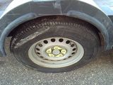 a flat tire on a trailer on the street
