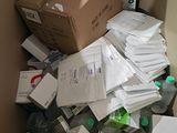 a cardboard box filled with lots of papers and other items