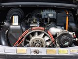 a car engine with a bunch of wires in it