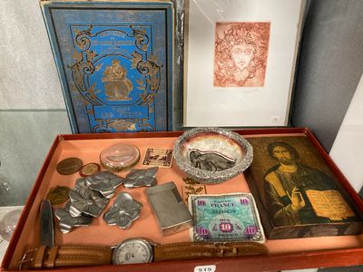 a wooden box with a variety of items in it