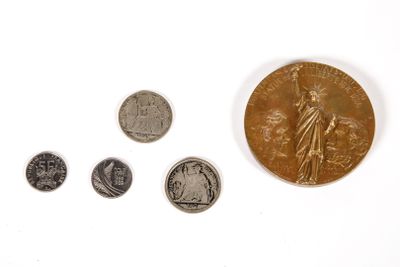 an image of a group of coins sitting on top of a white surface