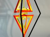 a lamp that is shaped like a diamond on a table