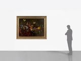 a man that is standing in front of a painting