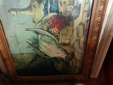a picture of a painting hanging on a wall in a room