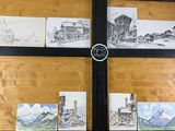une photo d'une fenêtre sur laquelle sont dessinés plein de dessins