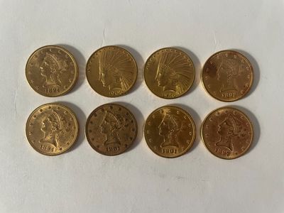 six types de pièces différents sont présentés sur une surface blanche