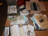 a table with a lot of books and papers on it