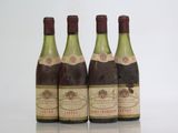 three bottles of wine sitting next to each other on top of a table