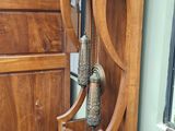 a grandfather clock that is on display in a room