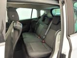 a car that has two seats in the back of it