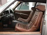 a brown leather seat in the back of a car