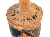 an old vase with a black and white design on it