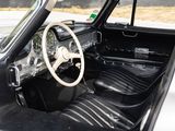 a black and white car with a steering wheel and dashboard