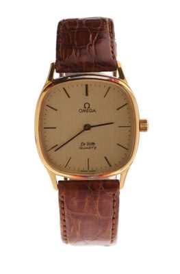 a close up of a watch on a white background with a brown strap