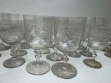 a lot of empty wine glasses sitting on a table