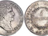 a close up of a coin on a white background