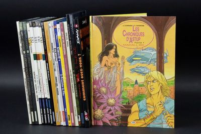 a lot of books that are sitting on a table