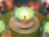 close up of a pinball machine with a bunch of lights on top of it