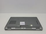 a laptop that has a sticker on the back of it