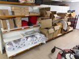 many boxes of toilet paper on the shelves in the store