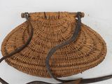 an image of a wicker purse on a white surface