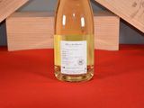 a bottle of wine that is sitting on a table