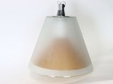 a lamp that is sitting on a white surface