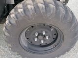a close up of a large tire on a truck