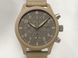 an image of a watch with a tan leather strap on a white background