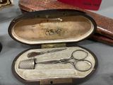 a pair of scissors in a case on a table