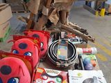 many items that are sitting on a table in a warehouse