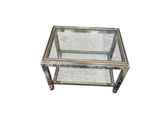 an image of a glass coffee table with a metal frame and glass top
