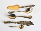 several different types of spoons and spoon spoons on a white surface