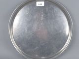 a silver tray with a silver lid on a table