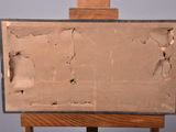 a picture of a wooden easel with a piece of paper on it