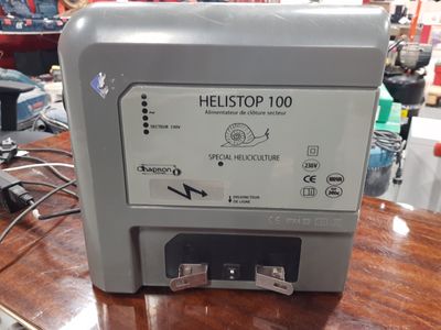 a machine that is sitting on top of a wooden table