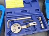 a blue case with tools in it sitting on a table
