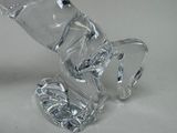 a clear glass vase that is sitting on a table