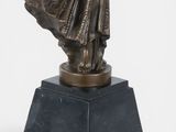 bronze statue of a woman holding a fan on a marble base
